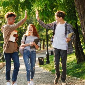 School friends walking and talking outside